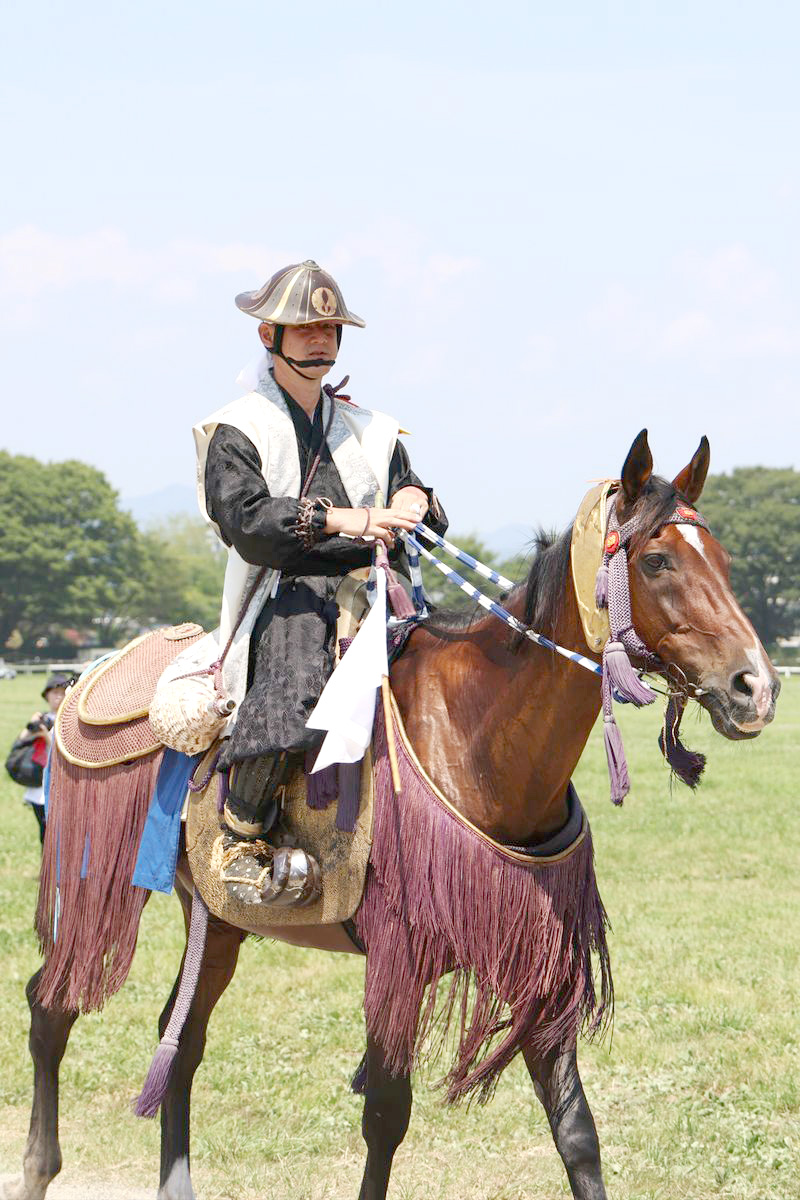 螺役（かいやく）を務めた大熊町騎馬会の渡部さん